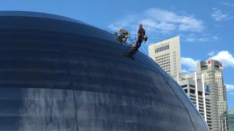 Singapore: Workers on new Apple Flagship Store at Marina Bay Sands, 4K Stock Footage 146056031