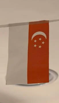 Singaporean flag oriented vertically Stock Photos