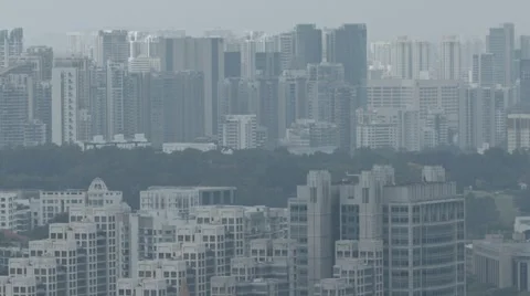 Singapore's crowded highrise landscape through the fog. Video 1920x1080 库存影片 61086512