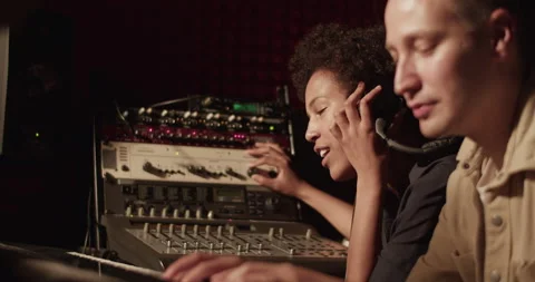 Singer and pianist working in studio Stock Footage 201849956