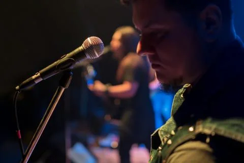 Singer in front of a microphone Stock Photos