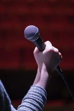 Singer Holding Microphone Before Taking the Stage Stock Photos