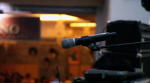 Singer microphone on concert stage waiting for music band, speaker, close up Stock Footage 34689451