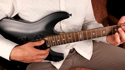 Singer playing guitar Stock Footage 240134371