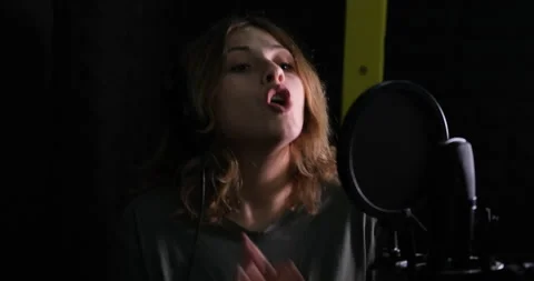 Singer Recording Funny Track In Studio. Stockbeeldmateriaal 149082049
