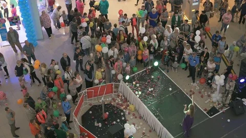 Singer sings during opening day of shopping center Stock Footage 76966557