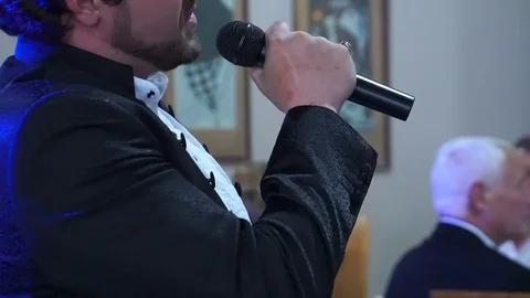 The singer sings in a restaurant. Stock Footage 76596290