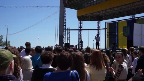 Singer sings in the square Stock Footage 108461419