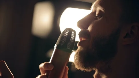 Singer sings in the studio Video stock 96177131