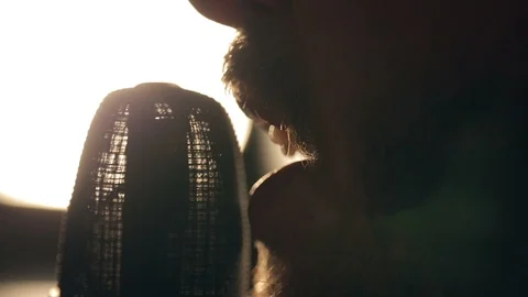 Singer sings in the studio Видео 96177344