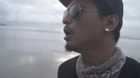 Singing in the beach Stock Footage 243095799