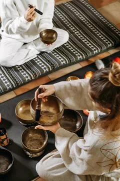 Singing bowls top view, sound healing alternative therapy. Overhead view Stock Photos