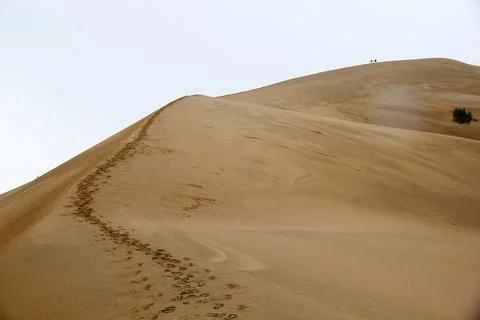 The singing dune in the Aktau mountain range at the Altyn Emel National Par.. Stock Photos