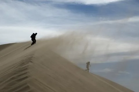 A singing dune - storm. Stock Photos