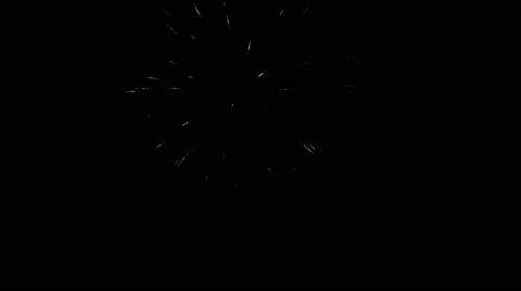 A single aerial firework rains down in white sparks Stock Footage 59126143