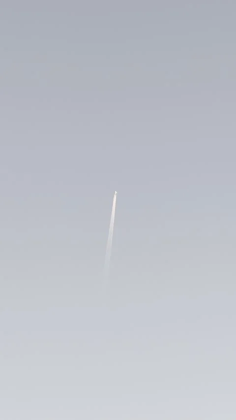 Single Airplane Contrail in Gray Sky Stock Footage 344601352