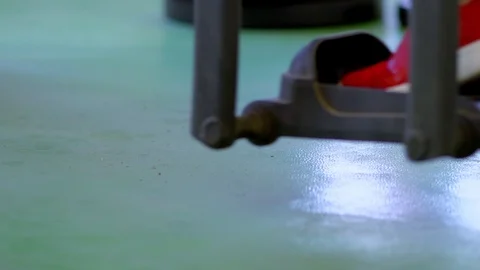 Single athlete exercising on bicycle machine Stock Footage 121449175