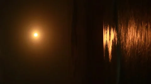 A single beam of light illuminates the dark night sky, with stars and cloud.. Stock Footage 342175225
