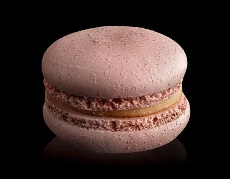 Single beige macaroon angled view Stock Photos