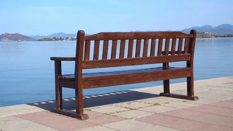 Single bench at the seafront Stock Footage 79319157