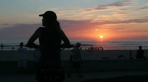 Single biker watching the sun set Stock Footage 11910272
