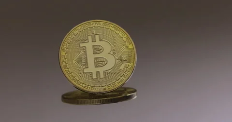 Single Bitcoin with Clean Background Stock Footage 148180994