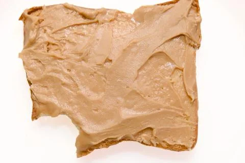Single Bite Out of a Peanut Butter Toast Stock Photos