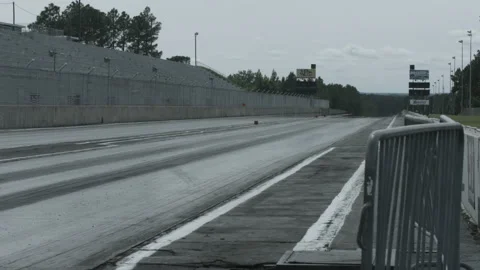Single Black Car on Drag Stock Footage 138288507