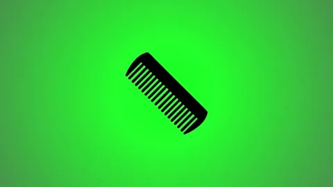 Single black comb slowly appears and animates on bright green screen backgr.. 库存影片 346490953
