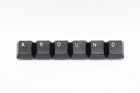 Single black keys of keyboard with different letters AROUND Stock Photos