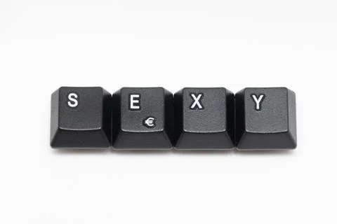 Single black keys of keyboard with different letters SEXY Stock Photos