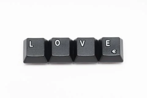 Single black keys of keyboard with different letters LOVE Stock Photos