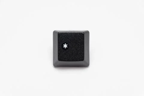 Single black keys of keyboard with different letters times Stock Photos