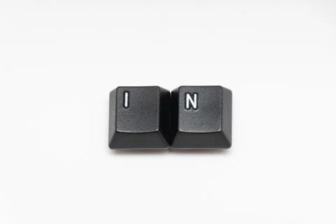 Single black keys of keyboard with different letters IN Stock Photos