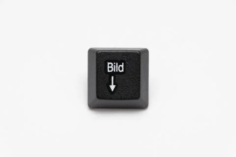 Single black keys of keyboard with different letters pic down Stock Photos
