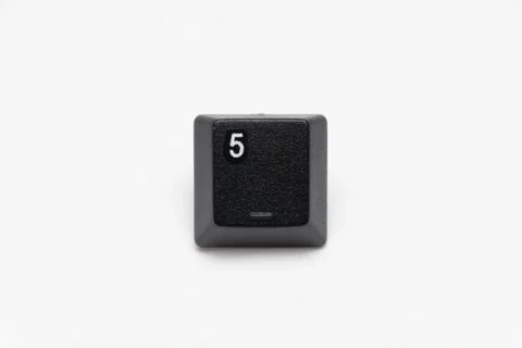 Single black keys of keyboard with different letters five Stock Photos
