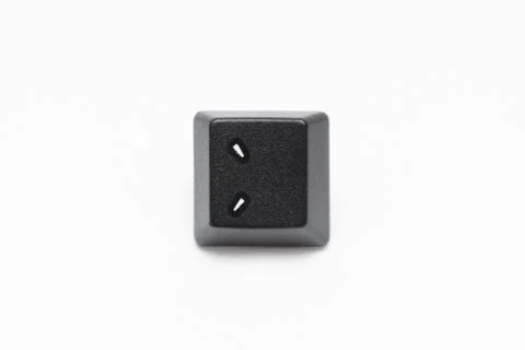 Single black keys of keyboard with different letters colon Foto stock