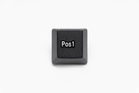 Single black keys of keyboard with different letters pos1 Stock Photos