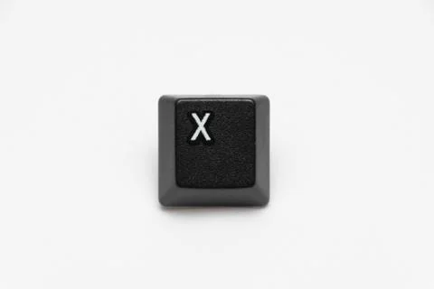 Single black keys of keyboard with different letters X Foto stock