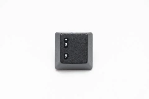 Single black keys of keyboard with different letters komma Stock Photos