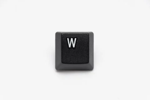 Single black keys of keyboard with different letters W Stock Photos