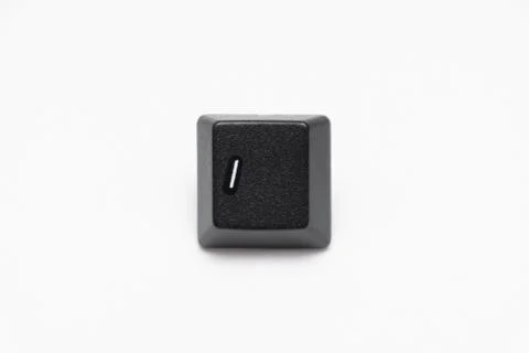 Single black keys of keyboard with different letters divided Stock Photos