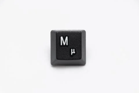 Single black keys of keyboard with different letters M Foto stock