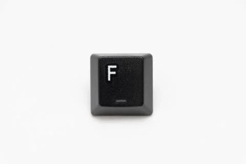 Single black keys of keyboard with different letters F Stock Photos