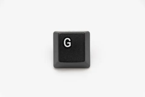 Single black keys of keyboard with different letters G Stock Photos