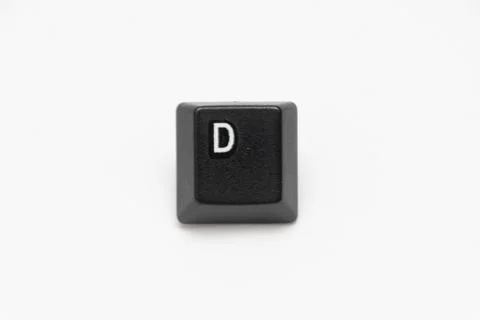 Single black keys of keyboard with different letters D Stock Photos