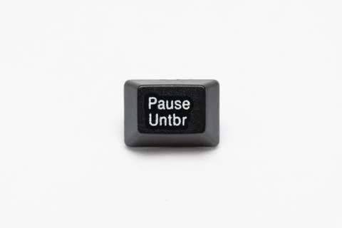 Single black keys of keyboard with different letters pause Foto stock