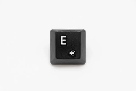 Single black keys of keyboard with different letters E Stock Photos