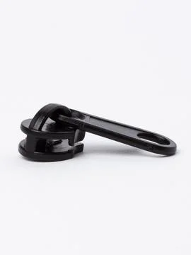 Single black zipper pull angled view Foto stock