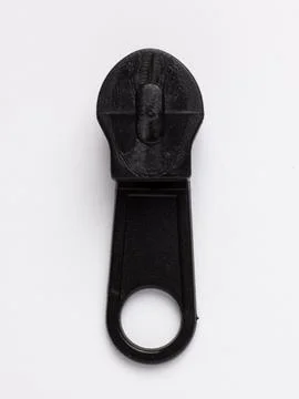 Single black zipper pull close up Stock Photos